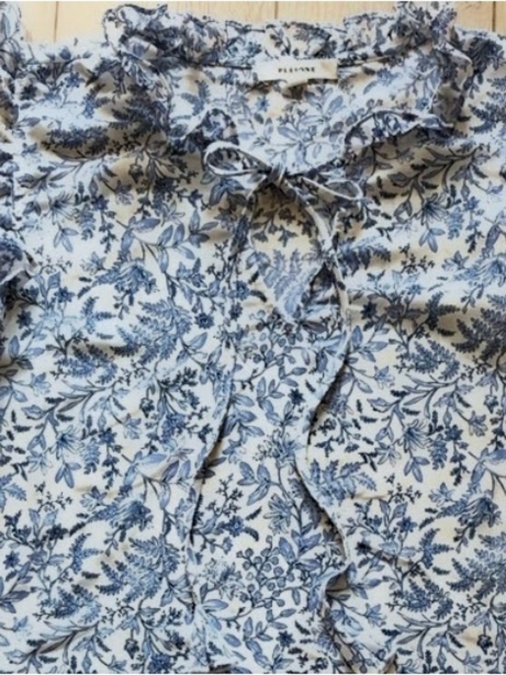 Pleione Cream Top with Blue Floral Print